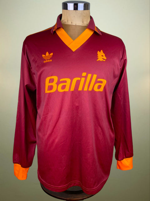 Maroon AS Roma 1993-94 Adidas jersey with orange accents on a mannequin against a neutral background