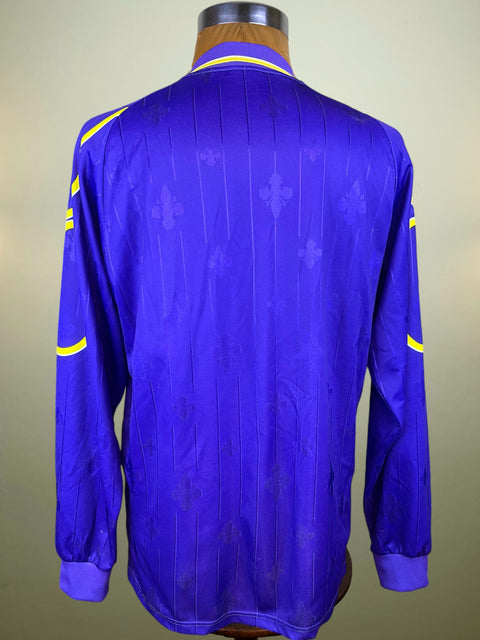 Blue Fiorentina 97-98 jersey made by Fila with Nintendo Sponsor on a mannequin against a neutral background