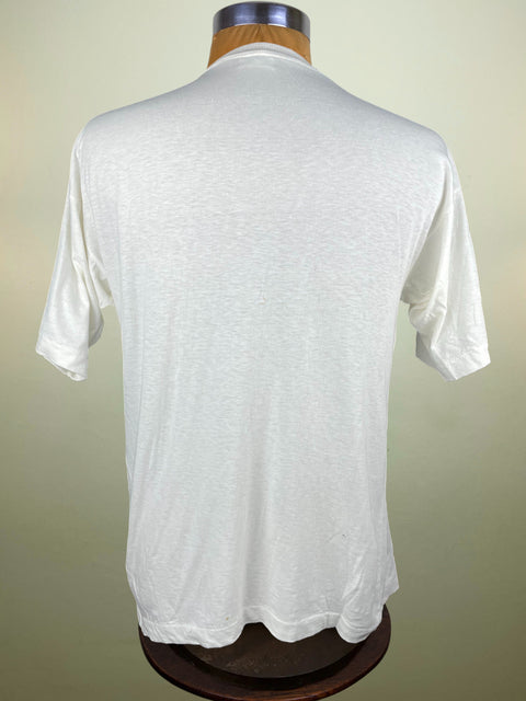 White t-shirt on a mannequin against a plain background