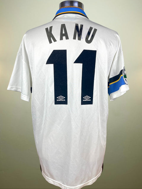 White sports jersey with 'KANU' and number '11' on a neutral background