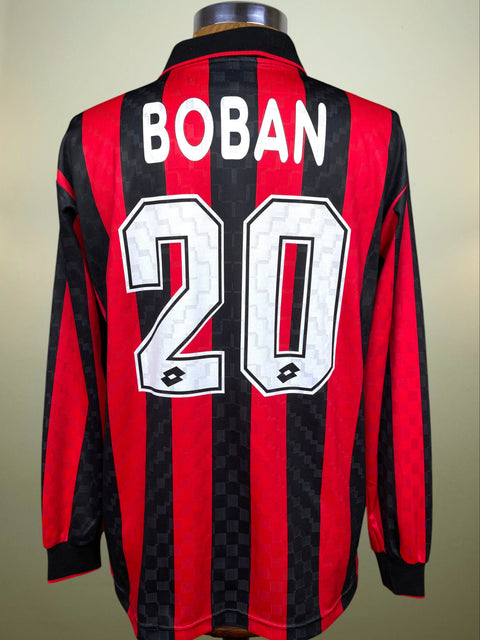 Red and black striped sports jersey with 'BOBAN' and number '20' on a neutral background
