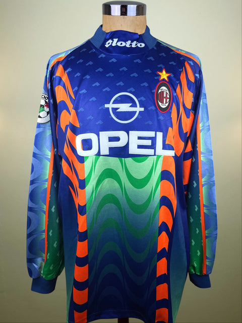 Colorful AC Milan 1997-98 Goalkeeper jersey with Opel branding on a mannequin against a neutral background