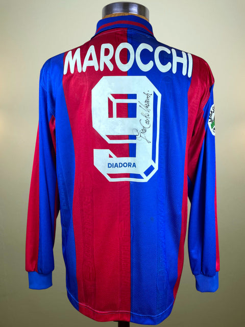 Red and blue Bologna 1995 Home jersey with 'Marocchi' and number '9' on a beige background