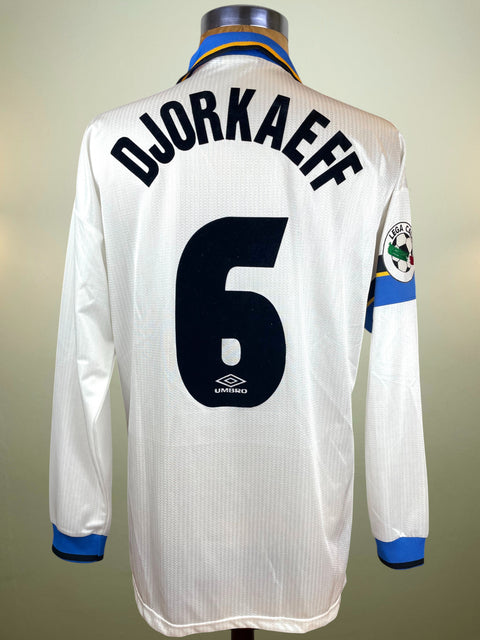 White Inter Away jersey with 'Djorkaeff' and number '6' on a mannequin against a neutral background