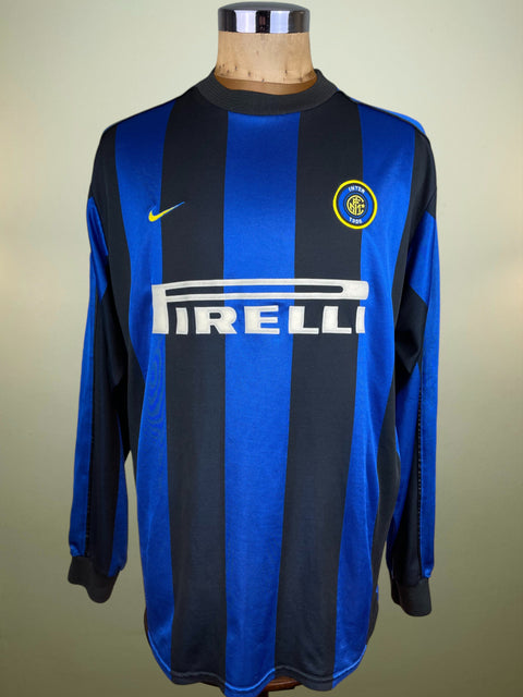 Blue and black match worn Zamorano 1999-00 Inter Milan home jersey with Pirelli and Nike logos on a mannequin against a neutral background
