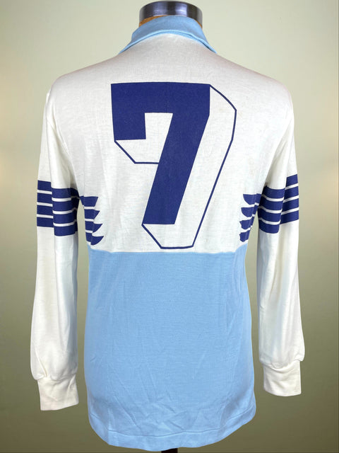 Vintage Lazio 1982 home jersey made by Ennerre with number 7 on a plain background