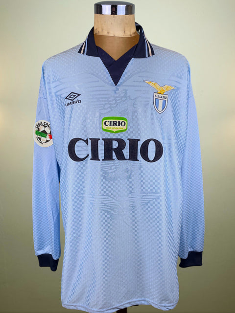 Light blue Lazio 1996 jersey with Cirio branding and Umbro Sponsor on a mannequin against a neutral background