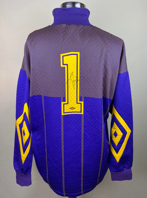Match worn blue long sleeve Napoli goalkeeper shirt from the 1993-94 season worn by Giuseppe Taglialatela with number 1 on the back. Made by Umbro. The shirt is autographed within the number