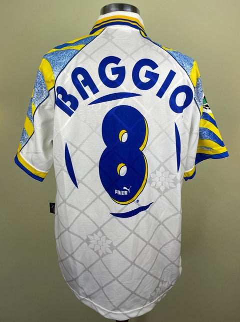 Match worn white Dino Baggio Parma short sleeve home shirt from the 1996-97 season, with name and number 8 in the fabric of the shirt. Made by Puma.