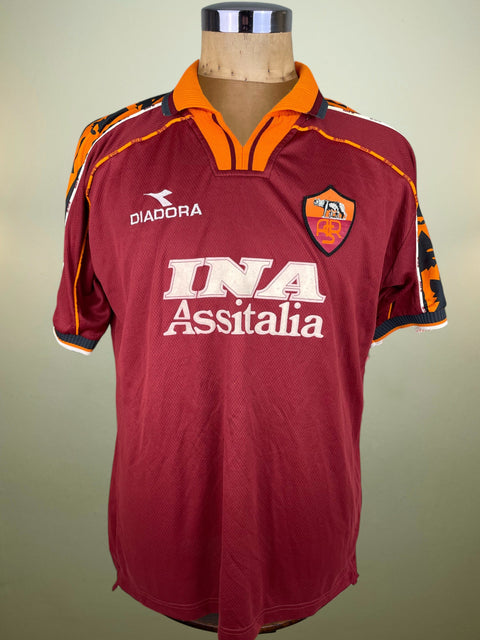 Maroon AS Roma 1998/99 home shirt, short sleeves, INA Assitalia Sponsor across the chest. Match-worn by Marco Delvecchio. Diadora logo.
