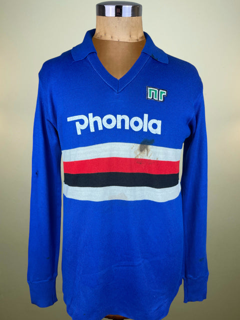 Blue Sampdoria home shirt with 'Phonola' branding and made by Ennerre on a mannequin against a neutral background