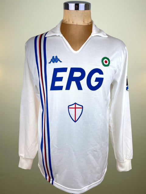 White Sampdoria Away jersey with blue 'ERG' logo on a mannequin against a beige background
