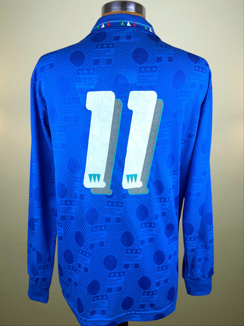 Blue Italy 1994 jersey with Giuseppe SIgnori's number 11 on a beige background
