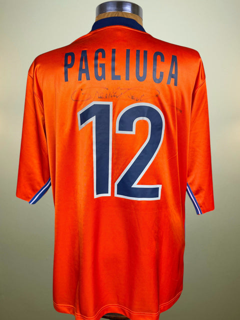 Orange sports jersey with 'Pagliuca' and number '12' on a plain background