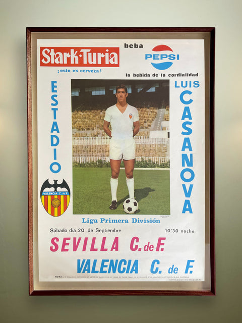 Framed soccer poster featuring Luis Casanova with Sevilla C. F. and Valencia C. F. logos.