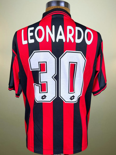 AC Milan red and back Home Shirt with the name "Leonardo" nd the number 30 printed into the fabric in white.