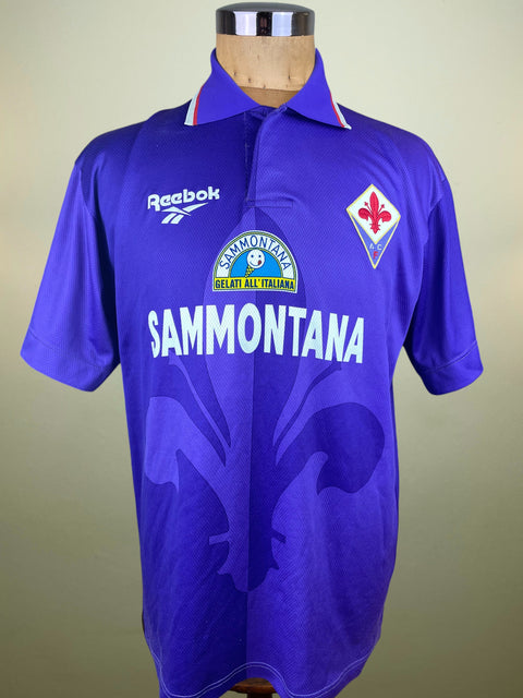 Purple Fiorentina Home 1995-96 jersey with Reebok and Sammontana logos on a mannequin against a plain background