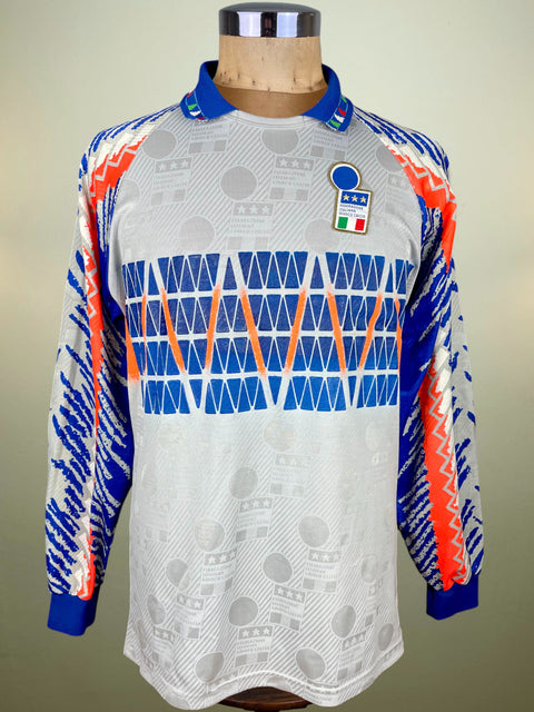 World Cup 1994 Diadora Goalkeeper jersey with geometric pattern and Italian flag on a mannequin against a neutral background