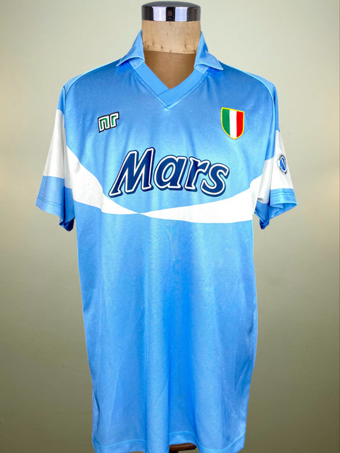 Blue SSC Napoli Home jersey with 'Mars' and NR branding on a mannequin against a plain background
