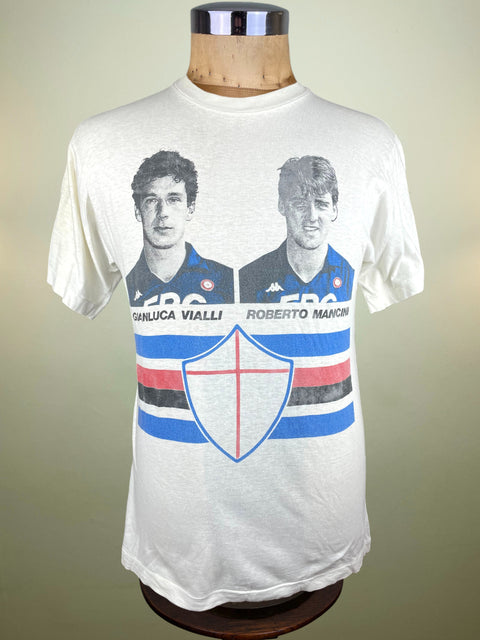 White t-shirt with printed graphic of Gianluca Vialli and Roberto Mancini on a mannequin against a plain background