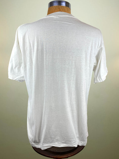 White t-shirt on a mannequin against a plain background