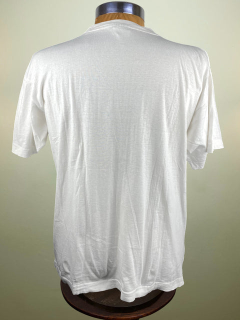 White t-shirt on a mannequin against a plain background