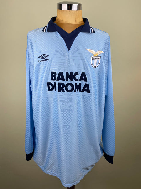 Match worn blue long sleeve Lazio home shirt from the 1995-96 season worn by Roberto Di Matteo with Banca Di Roma Sponsor in black flock across the front of the shirt. Made by Umbro.