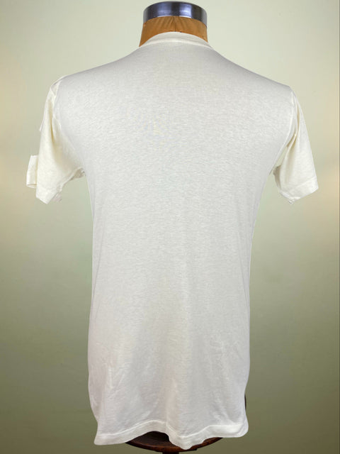 White t-shirt on a mannequin against a plain background