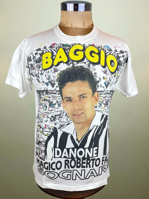T-shirt with a graphic of Roberto Baggio and text on a mannequin against a plain background