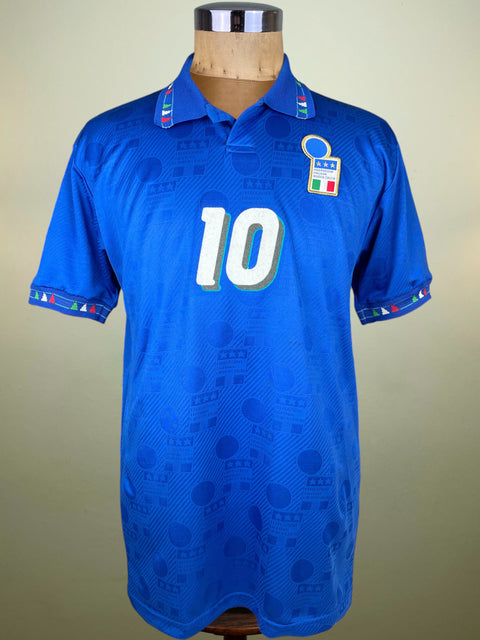 Blue Diadora Italy World Cup 1994 jersey with number 10 on a mannequin against a beige background