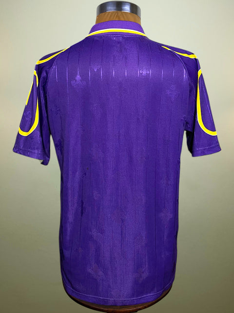 Purple Fiorentina 1997-98 Shirt with yellow accents on a mannequin against a beige background