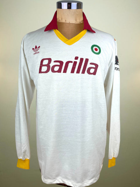 White AS Roma 1991 Adidas jersey with Barilla logo on a mannequin against a neutral background