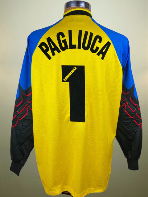 Yellow Inter Milan Gaolkeeper jersey with black number 1 and 'Pagliuca' on a mannequin against a beige background