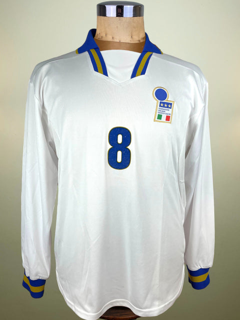 White Italy 1996 jersey with blue number 8 on a mannequin against a neutral background