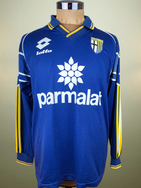 Blue Parma Training jersey with Lotto and Parmalat logos on a mannequin against a beige background