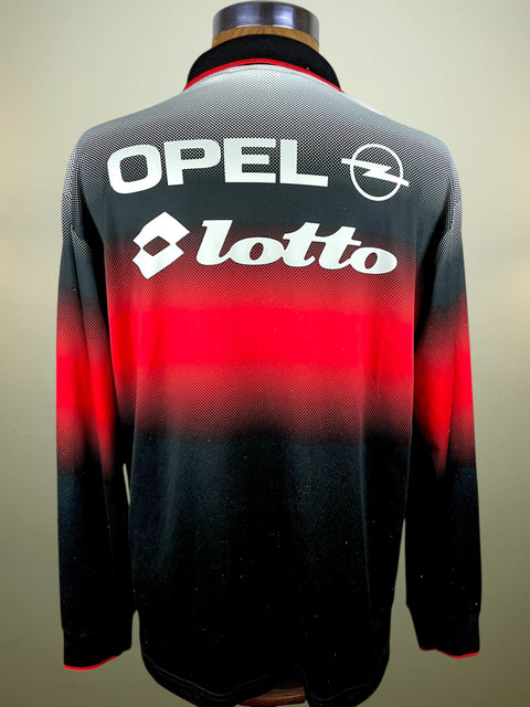 Opel and Lotto branded 1996-97 AC Milan Training Jersey on a neutral background