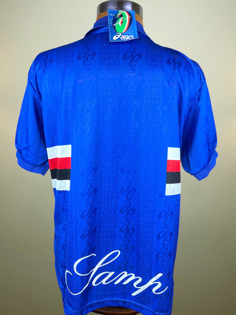 Blue Sampdoria 1996-97 Home jersey made by Asics with a logo on a mannequin against a beige background
