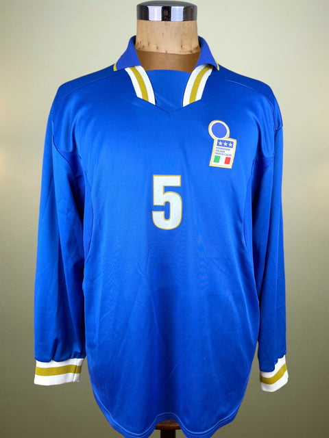 Blue Nike Italy Shirt with number 5 on a mannequin against a neutral background