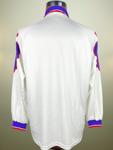 White Fiorentina 1995-96 Away jersey with red and blue accents on a mannequin against a neutral background