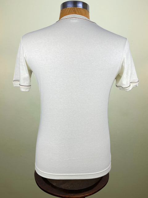 White t-shirt on a mannequin against a plain background