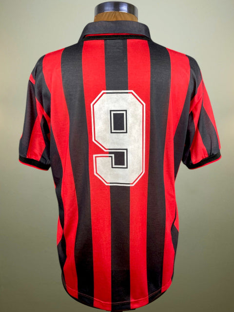 AC Milan match worn Marco Van Basten shirt with number 9 on the back and red and black stripes, made from Nido d'ape fabric.