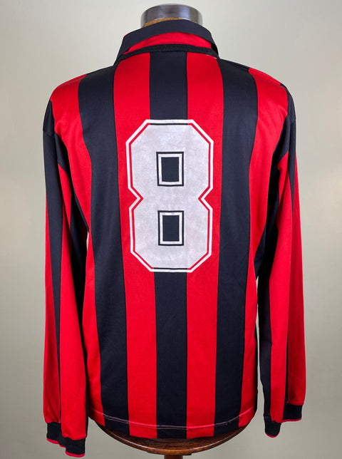 Frank Rijkaard Match Worn home AC Milan shirt with number 8 on the back and red and black stripes.