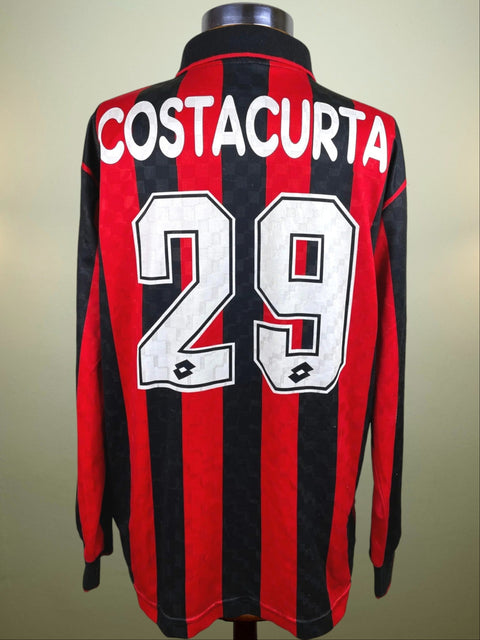 A short-sleeved red and black striped sports jersey with 'COSTACURTA' and the number '29' printed on the back.