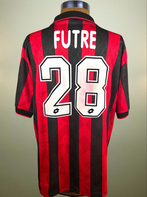Red and black striped sports jersey with 'FUTRE' and number '28' on a neutral background