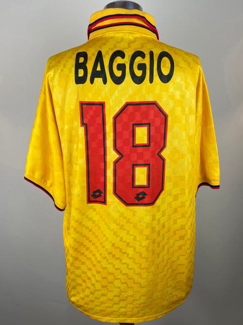 Yellow sports jersey with 'BAGGIO' and number '18' on a gray background