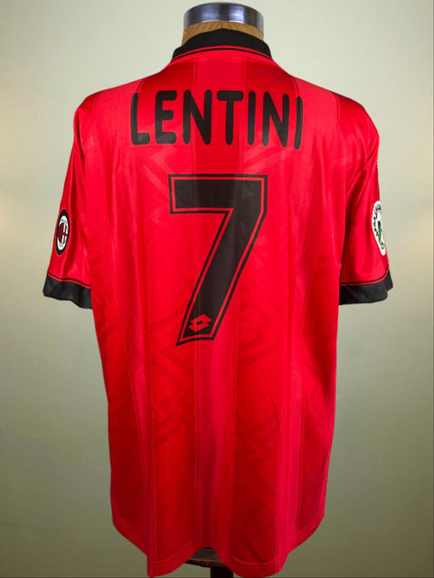 A red soccer jersey with the name 'LENTINI' and the number '7' on the back, along with the AC Milan club crest and a sponsor logo.
