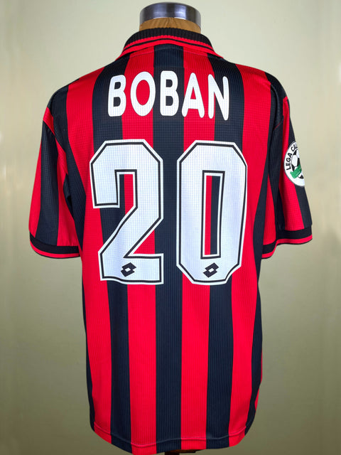 Back view of a red and black striped soccer jersey on a mannequin, featuring the name BOBAN and number 20 in white with black outlines.