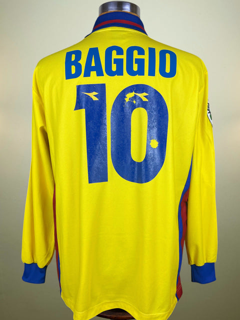 Yellow Bologna jersey with 'BAGGIO' and number '10' on a plain background