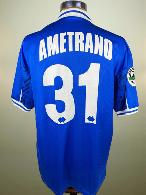 Blue Empoli jersey with 'Ametrano' and number '31' on a plain background
