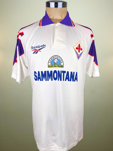 White Fiorentina jersey with Reebok and Sammontana branding on a mannequin against a light gray background